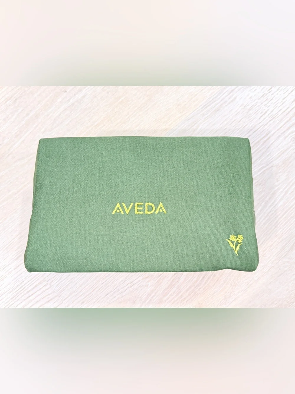 AVEDA Green Exterior with Tan Branded Interior Pouch